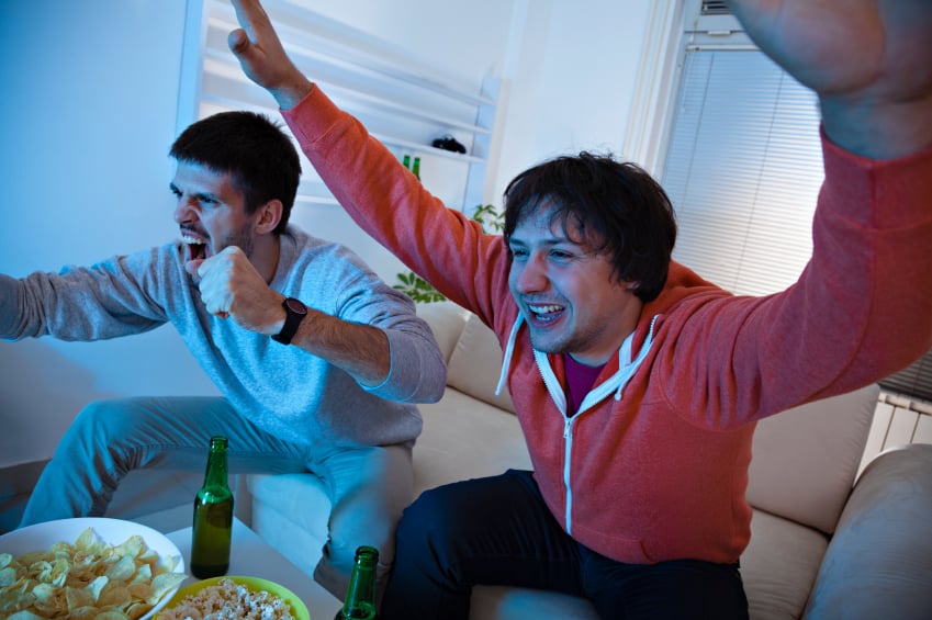 two guys watching tv