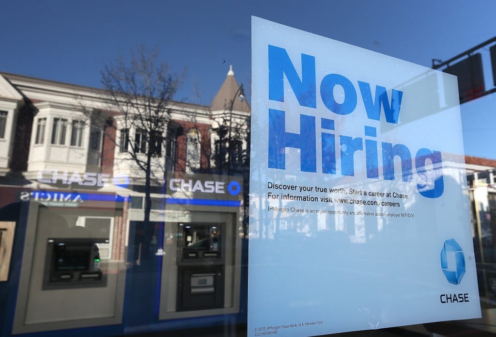 A "now hiring" sign at Chase