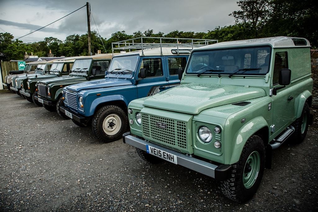 Land Rovers in a line