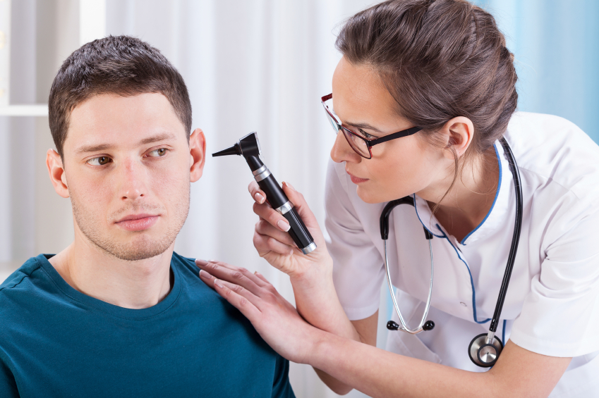 having ears examined at the doctor