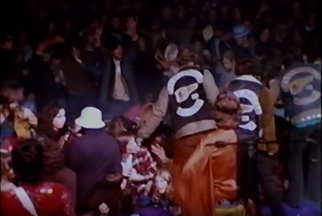 Hells Angels are approaching people in the audience of Altamont Free Concert.