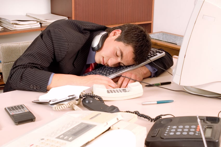 man sleeping at work