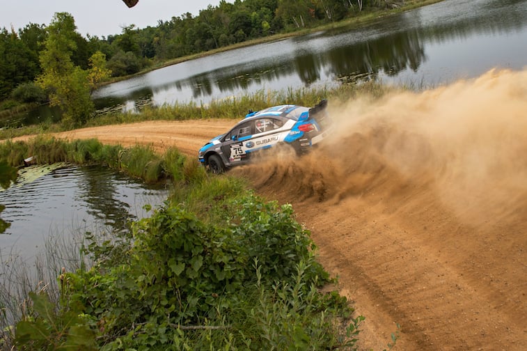 David-Higgins-and-codriver-Craig-Drew-sliding-between-lakes-in-northern-Minnesota-at-the-Ojibwe-Forest-Rally