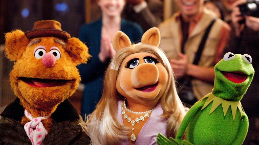 Fozzie, Miss Piggy and Kermit in 'The Muppets'