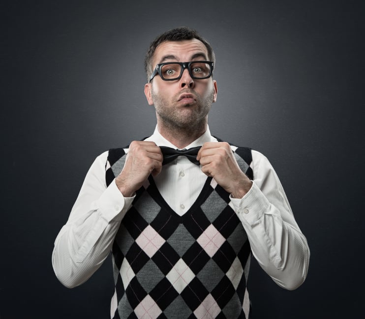 man swearing sweater vest