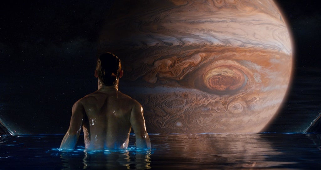 Man in a pool looking at jupiter in Jupiter Ascending