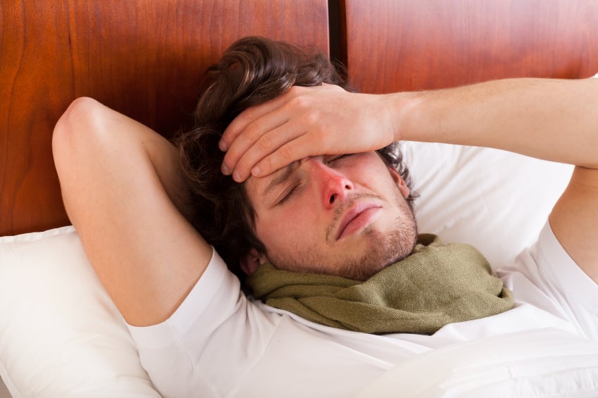young man sick with the flue