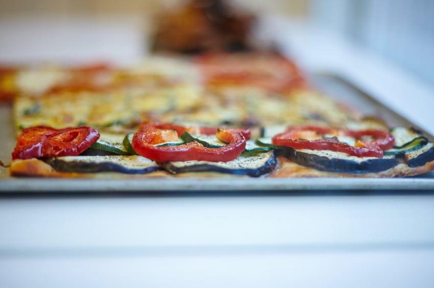 pizza with tomatoes and zucchini
