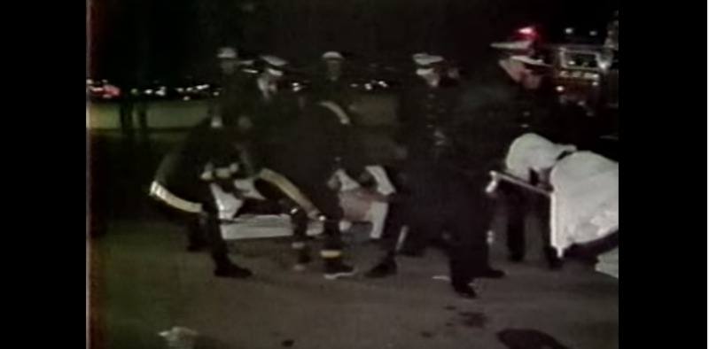 This is a picture of people being taken away on stretchers after the stampede.