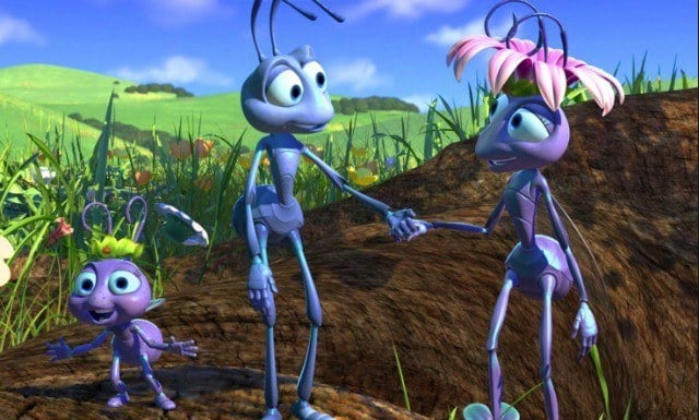 Bugs holding hands on a soil hill. 