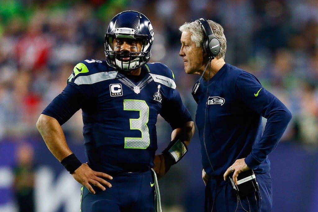 GLENDALE, AZ - FEBRUARY 01: Head coach Pete Carroll of the Seattle Seahawks talks to Russell Wilson #3 of the Seattle Seahawks in the second quarter during Super Bowl XLIX at University of Phoenix Stadium on February 1, 2015 in Glendale, Arizona. (Photo by Kevin C. Cox/Getty Images)