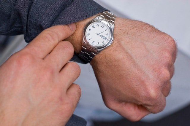 man checking his watch