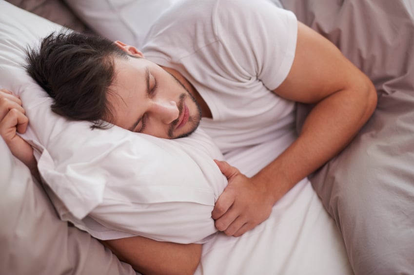 tired man in bed