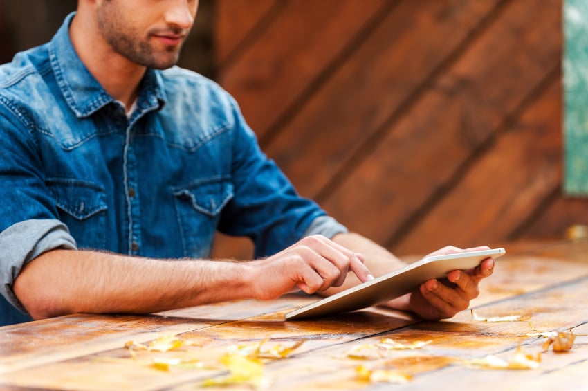 a man on his tablet