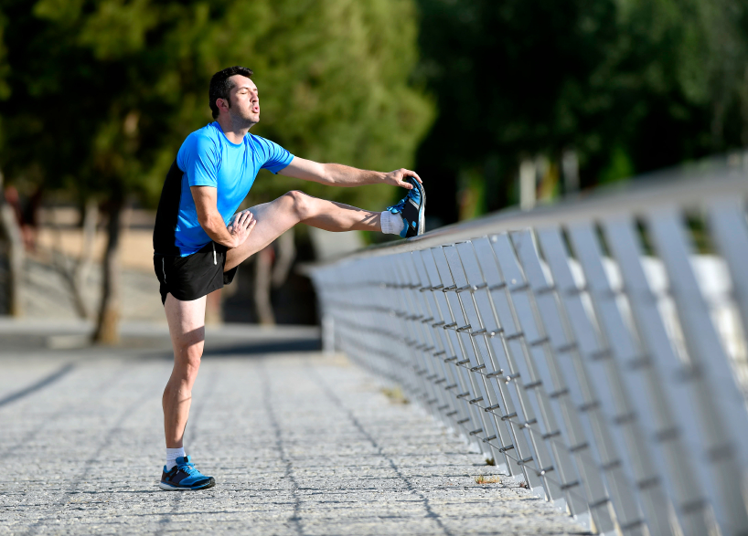 A man stretches before a run