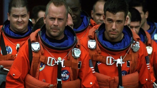 Bruce Willis and Ben Affleck wear orange space suits in 'Armageddon'