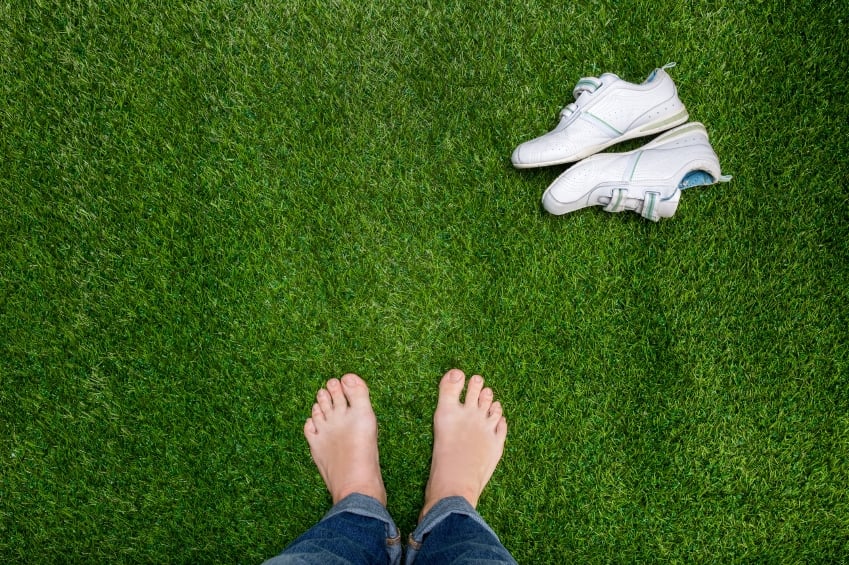 feet in grass