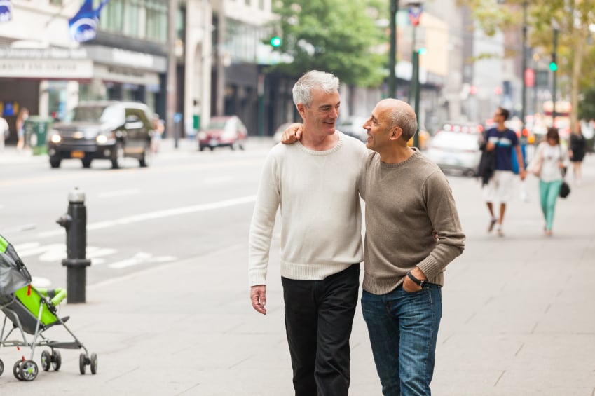Two men walking together Two men walking together