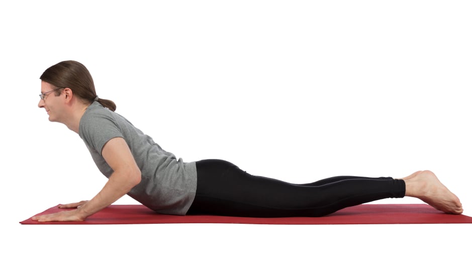 man in cobra pose, yoga