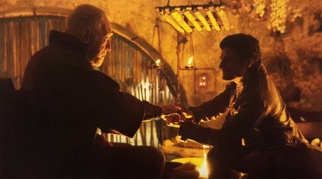 Lor San Tekka and Poe Dameron in Star Wars: The Force Awakens