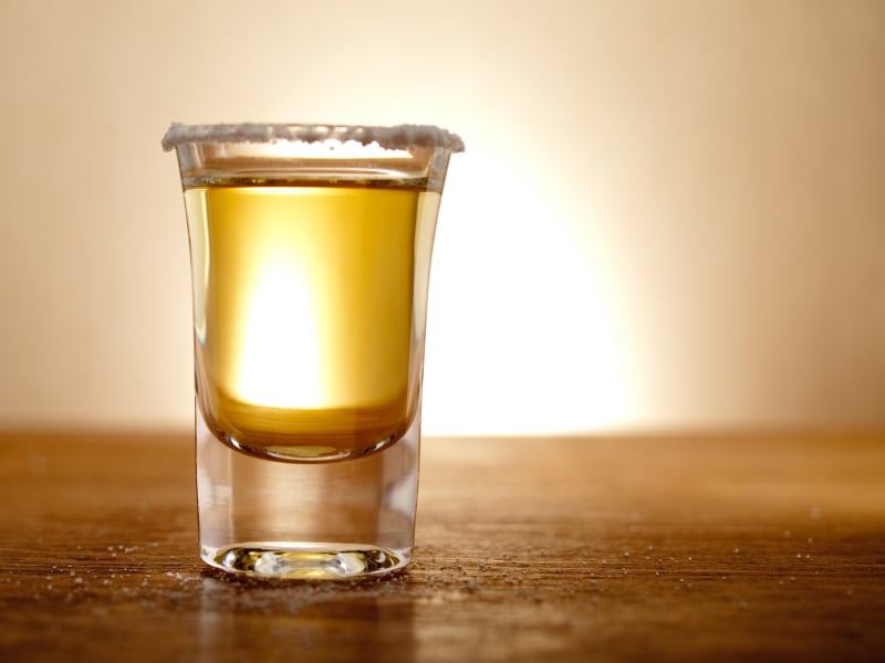 glass of backlit tequila