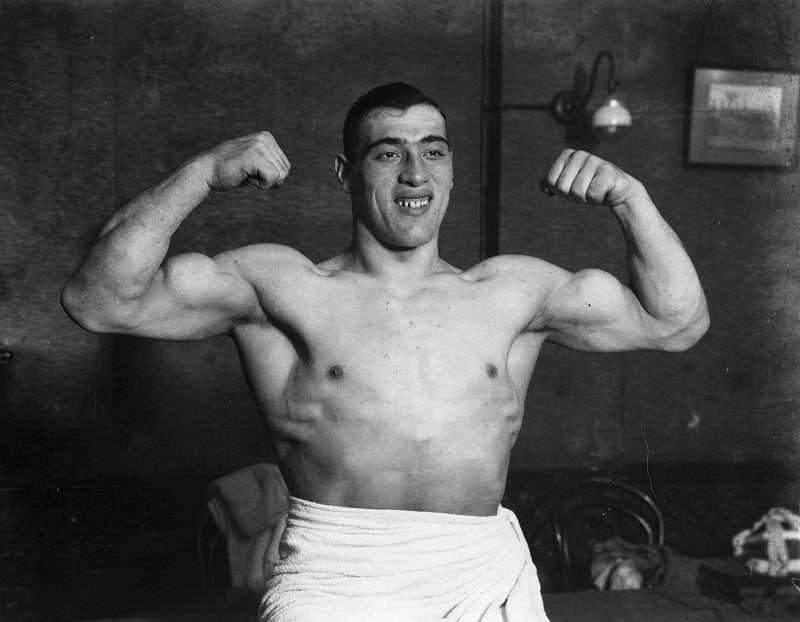 a man flexing his arms a man flexing his arms