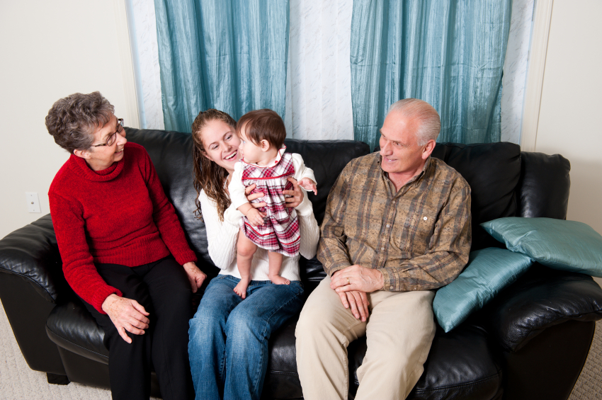 family with mother, grandparents, and a baby