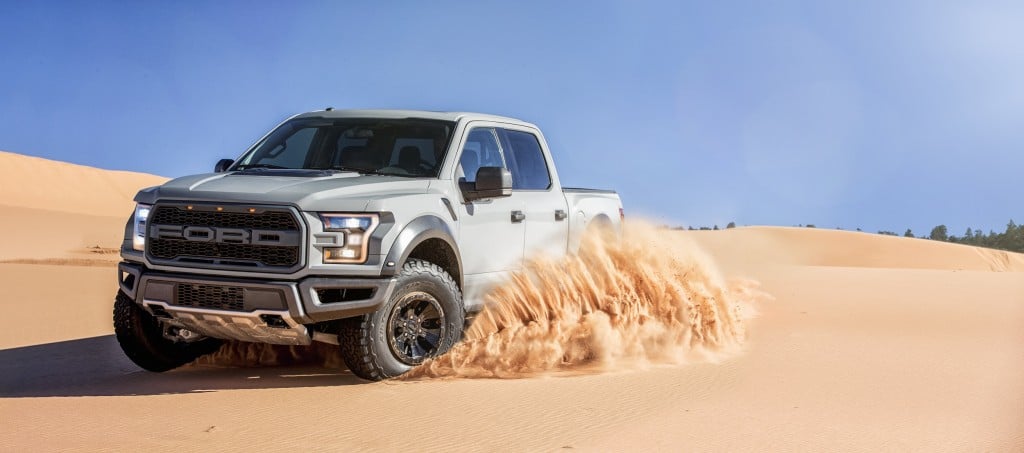 A 2017 Ford F-150 Raptor plays in the dunes