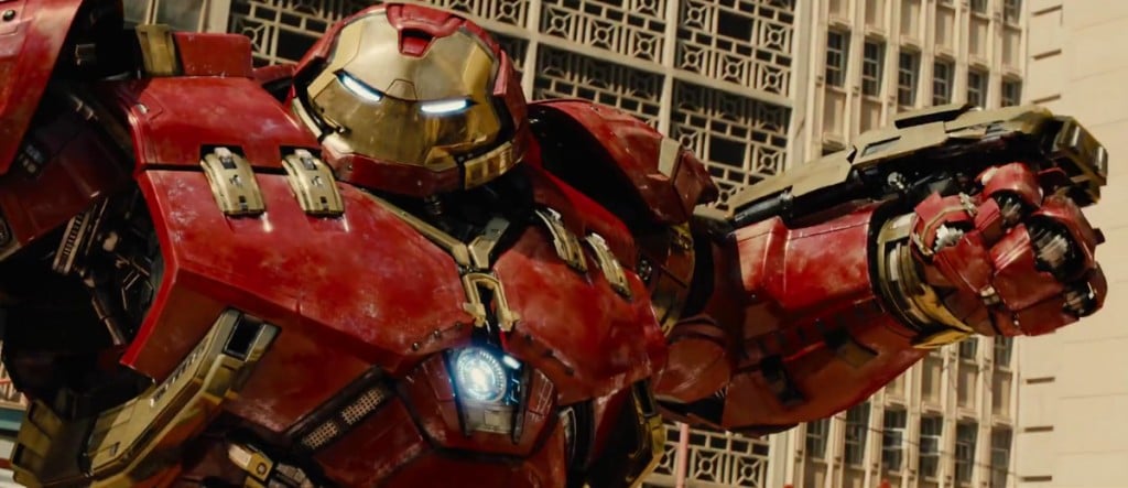 A person in Hulkbuster armor holds up their weaponized arms in Avengers: Age of Ultron A person in Hulkbuster armor holds up their weaponized arms in Avengers: Age of Ultron