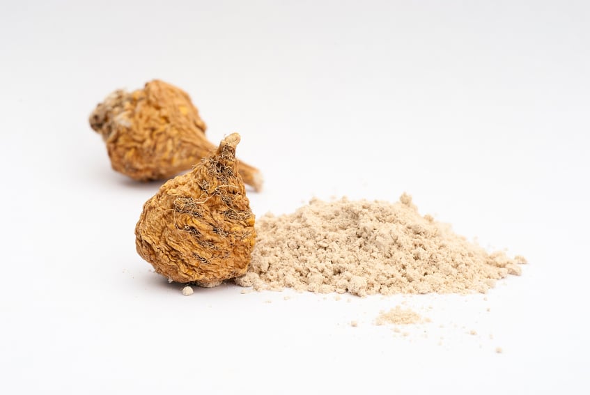 maca and its powder in a white background