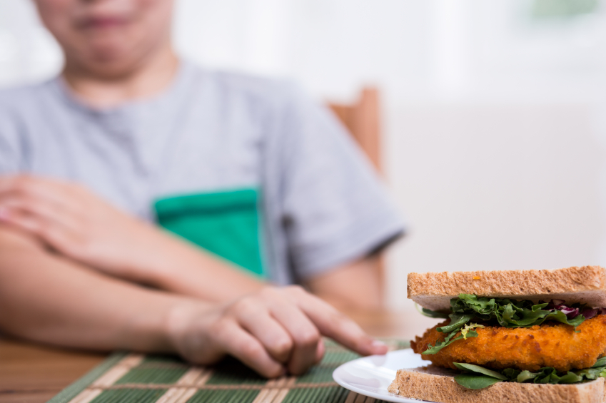 Chicken sandwich on dining table