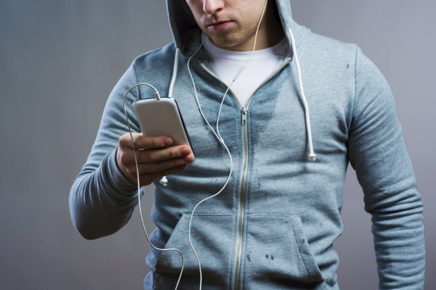 young runner using smartphone