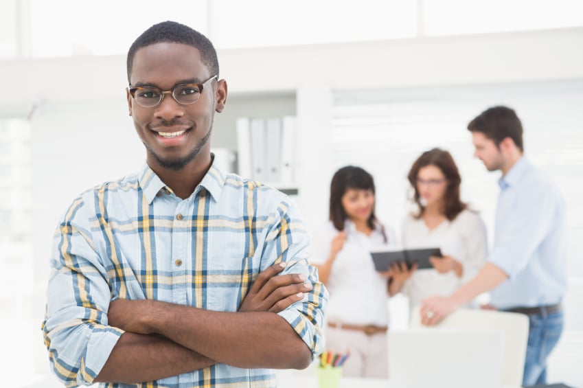 smiling young man in office