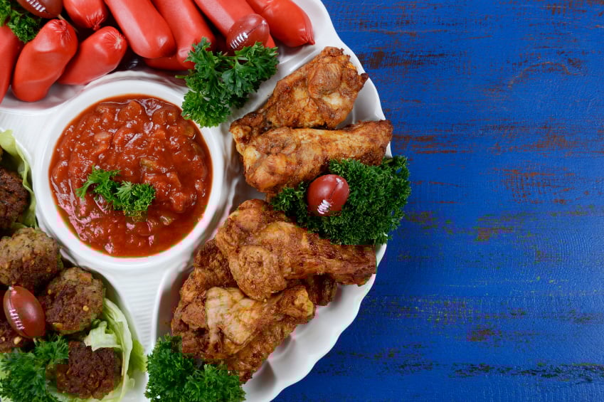 footaball party platter with wings, salsa, and cocktail winers