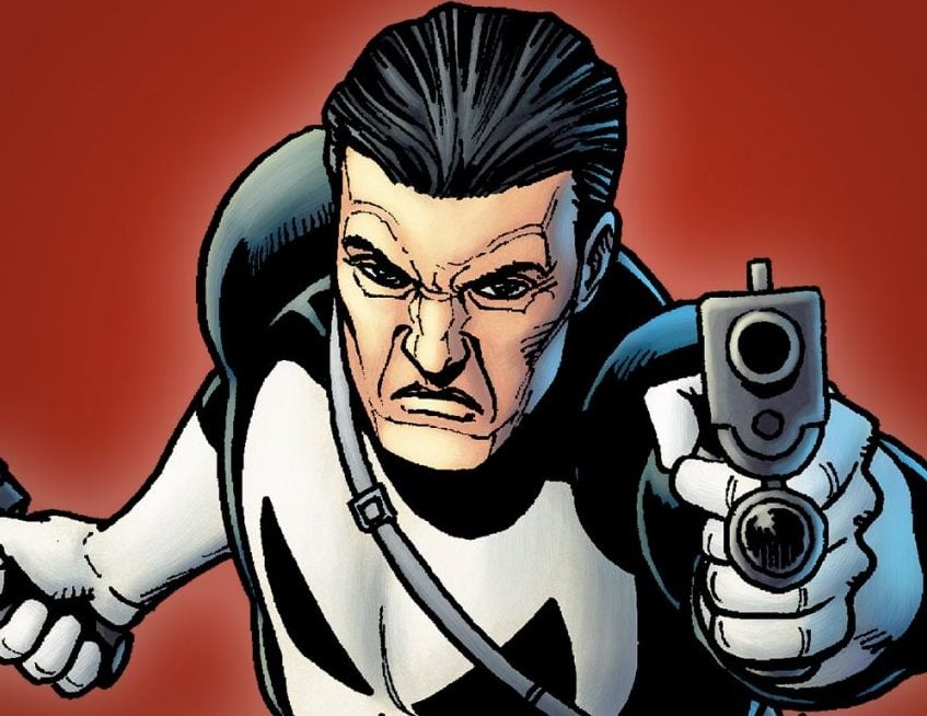 The punisher holds a gun up