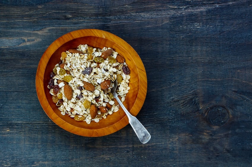 breakfast of muesli in wooden bowl