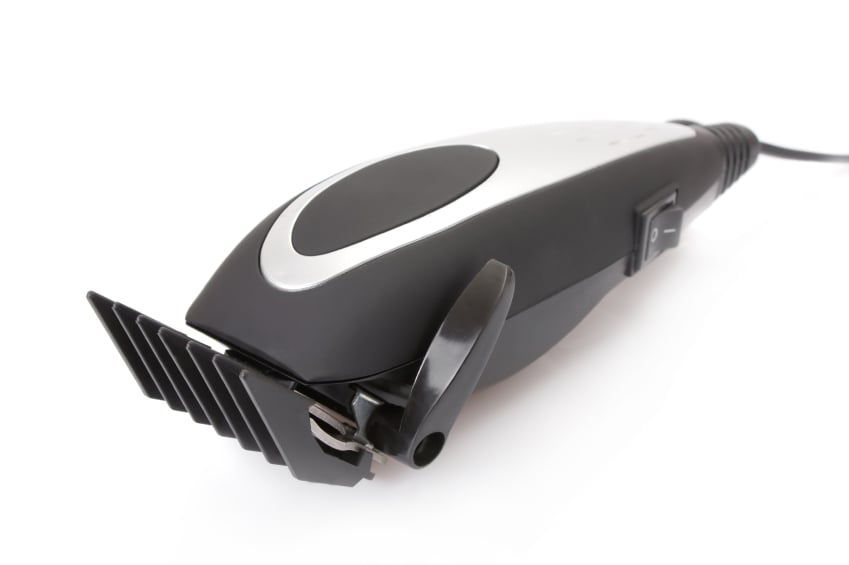 electric hair trimmer with white background