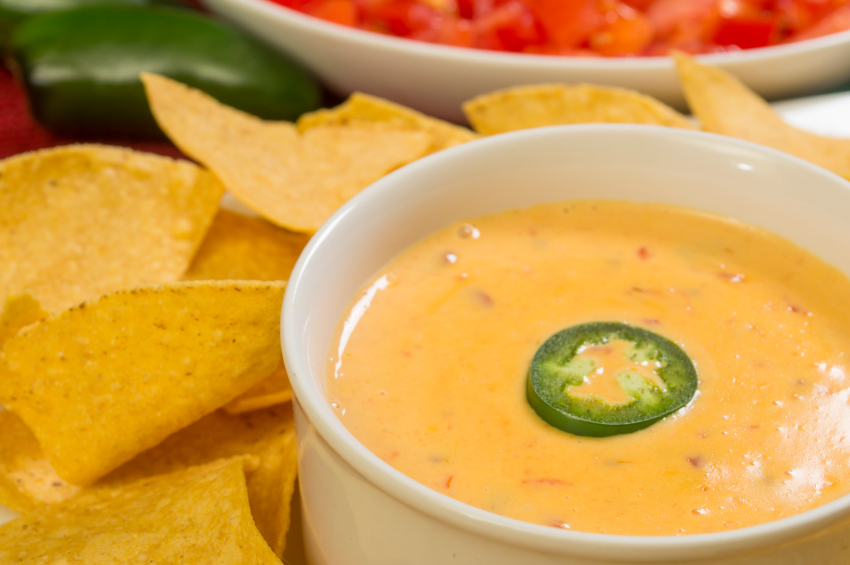 bowl of cheese with chips