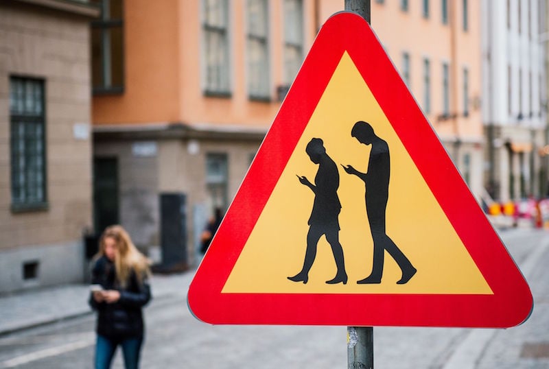 smartphone crossing sign