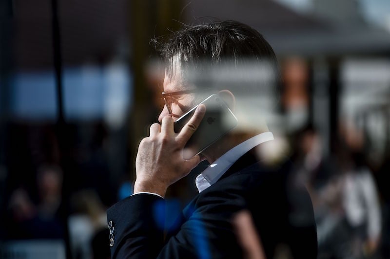 A man uses his smartphone