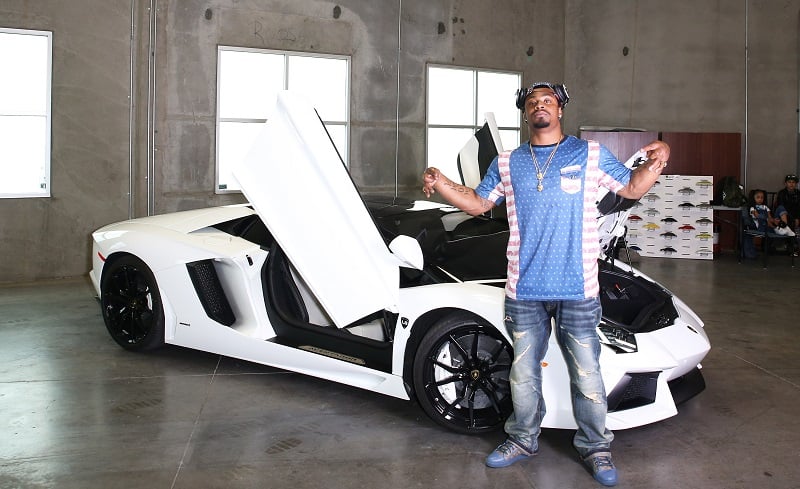 Marshawn Lynch with his Lamborghini
