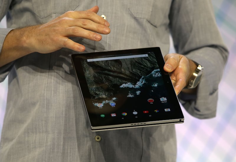 A developer working on a tablet