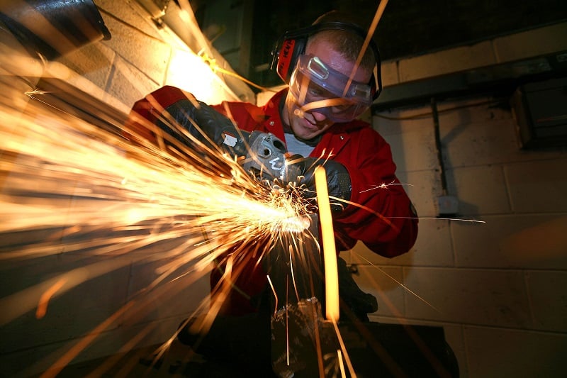 A man in a shop, hard at work