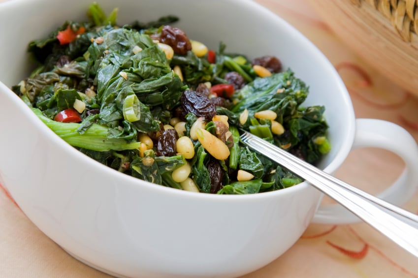 wilted spinach with dried fruit and nuts