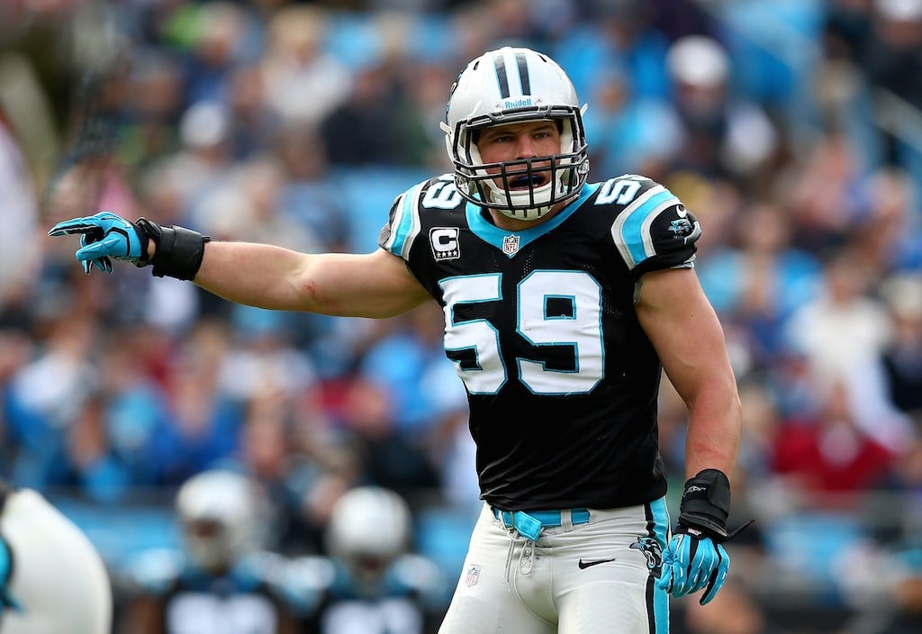 Carolina Panthers linebacker Luke Kuechly (#59) makes a pre-snap read during a game in 2015.
