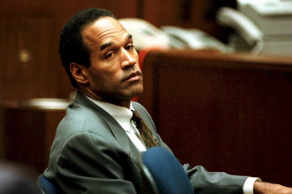 OJ Simpson in court, looking to the right of the frame