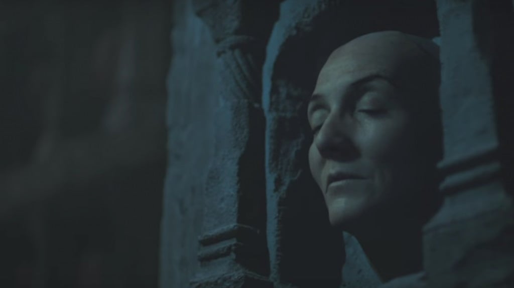 The face of Lady Catelyn Stark, displayed in a stone wall