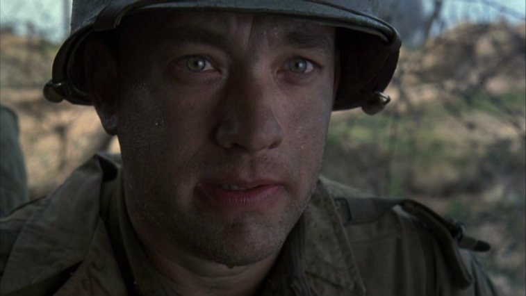 Tom Hanks wearing a uniform and helmet in 'Saving Private Ryan'.