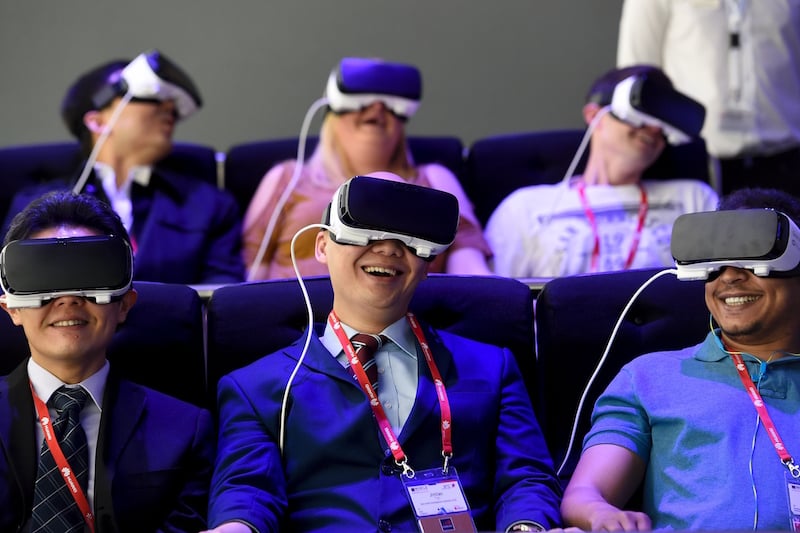 people wearing virtual reality headsets people wearing virtual reality headsets