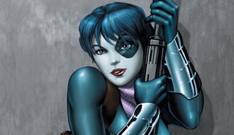 Domino clutching a gun and posing Domino clutching a gun and posing